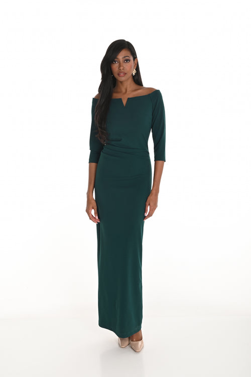 Woman wearing a green dress on a white background