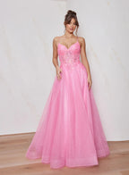 Woman wearing a pink evening gown with a white background