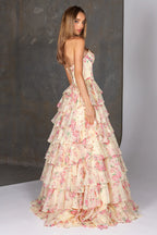 Woman wearing a floral dress with a plain background
