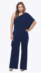 Woman wearing a navy blue jumpsuit on a white background