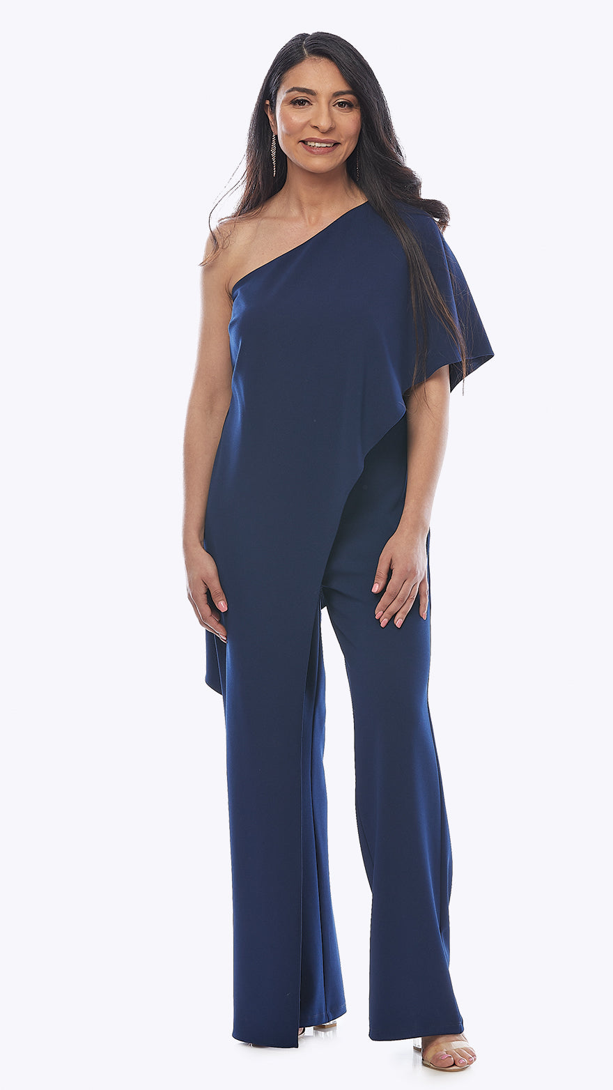 Woman wearing a blue one-shoulder jumpsuit on a white background