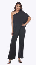 Woman wearing a black one-shoulder jumpsuit on a white background
