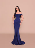 Woman wearing a blue off-shoulder gown on a beige background