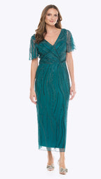 Woman wearing a teal evening gown with short sleeves on a white background