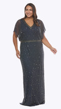 Woman wearing a sparkly black evening gown on a white background