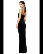 Woman wearing a black evening gown on a white background